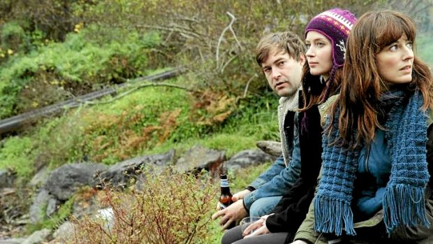 Mark Duplass, Blunt and Rosemarie DeWitt in a scene from the film.