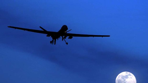 A US Predator drone flies prowls the night sky.