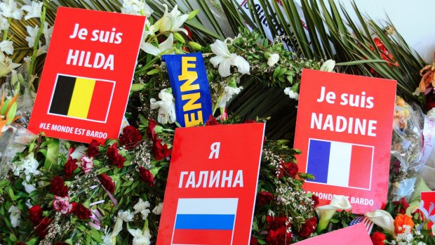 Placards reading "I am Hilda", and "I am Nadine", names of the victims of the attack on the Bardo Museum in Tunis. 