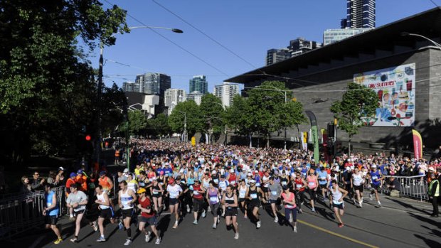 Runners set off from the Arts Centre in a 14-kilometre race and fun run that raised more than $250,000 for charities.