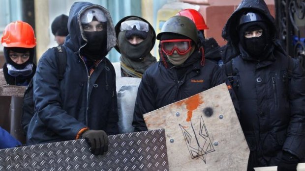 Anti-government protesters in central Kiev on Monday, January 27.