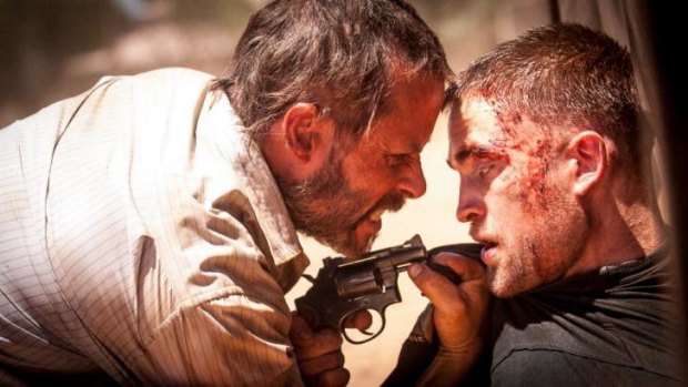 Guy Pearce and Robert Pattinson in <i>The Rover</i>.