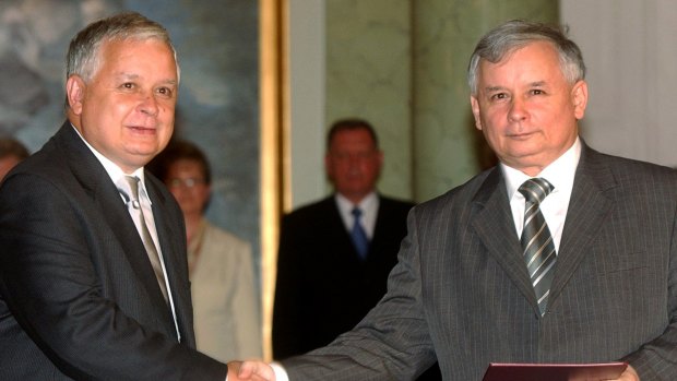 Leader of the ruling Law and Justice party Jaroslaw Kaczynski, right, with his twin brother Lech.