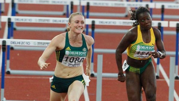 All smiles now . . . Sally Pearson wins the 100m hurdles.