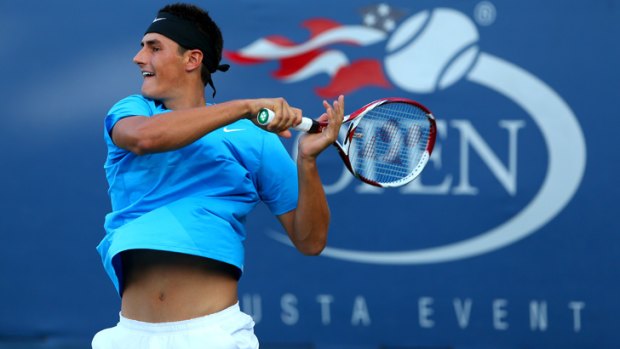 On song: Bernard Tomic lets rip during his first-round win.
