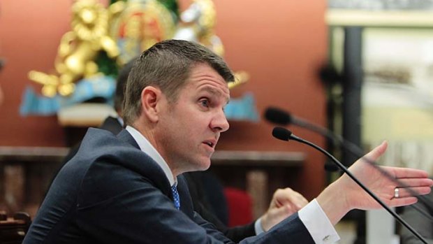 Up in smoke ... Mike Baird may bend to pressure from health experts and anti-smoking campaigners to abandon nearly $30 million that the NSW Treasury Corporation has invested in tobacco companies.