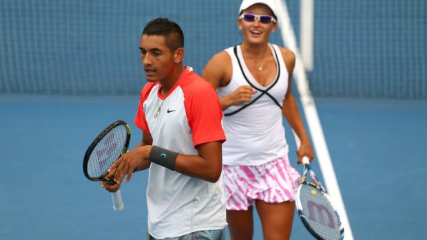 Nick Kyrgios and Arina Rodionova during their first round mixed doubles match.