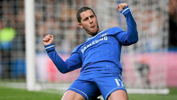Hat-trick: Chelsea's Eden Hazard celebrates after scoring the second goal against Newcastle United en route to a hat-trick for the new EPL leaders.