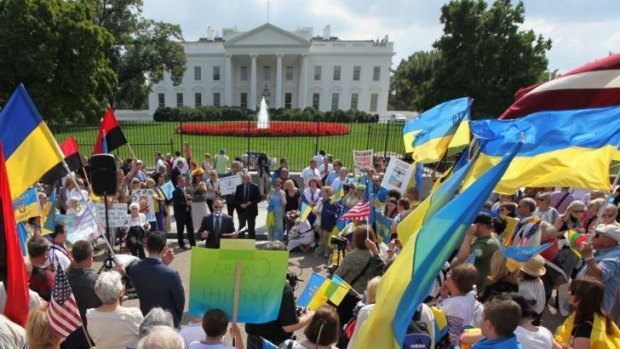 Ukrainian Americans rally in front of the White House.