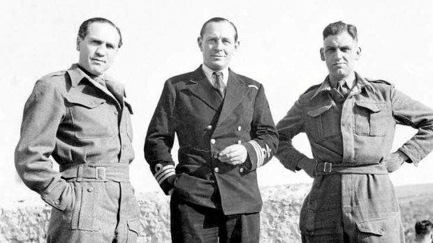 Sidney Bernstein (left), the producer of German Concentration Camps Factual Survey, with Lt Cdr Anthony Kimmins and Major Hugh Stewart.