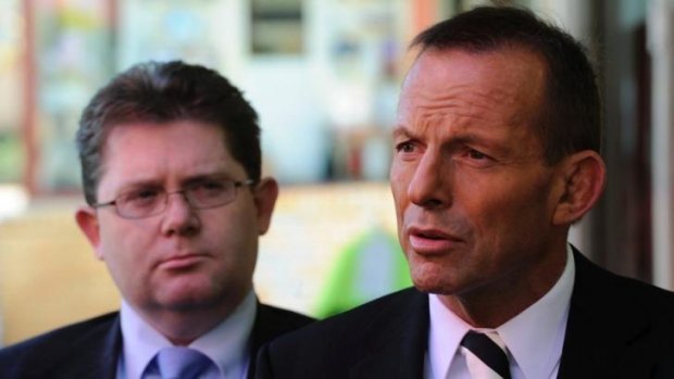 Tony Abbott with Victorian Senator Scott Ryan, parliamentary secretary for education. The federal government may axe funding for a youth unemployment initiative that has helped thousands of at-risk young people.