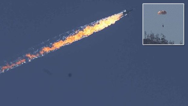 The Russian Su-24 on fire after being shot down by Turkish F-16s. 