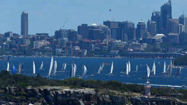 The fleet moves away from the start line during the 2013 Sydney to Hobart on December 26, 2013 in Sydney, Australia.