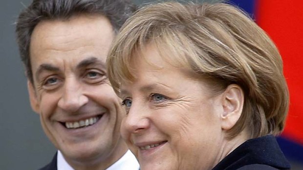 Tough demands ... French President Nicolas Sarkozy and German Chancellor Angela Merkel.