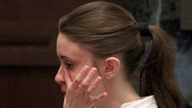 "Called herself a spiteful b----" ... Casey Anthony cries as she listens to her brother's testimony.