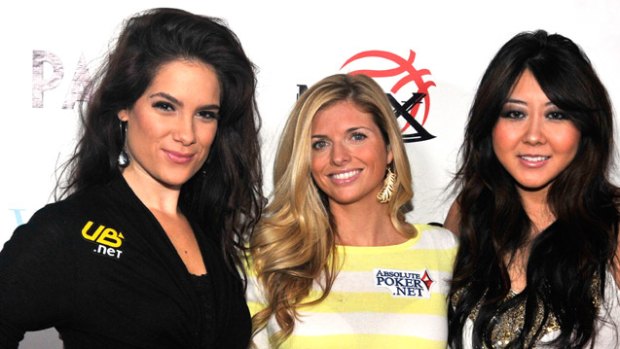 Maria Ho (right) with fellow professional poker player and The Amazing Race partner, Tiffany Michelle (left) join US television personality Trishelle Cannatella at a charity poker tournament at The Palms in Las Vegas.