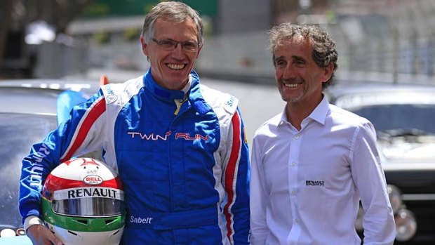 Renault chief operating officer Carlos Tavares poses with former French Formula one world champion Alain Prost.