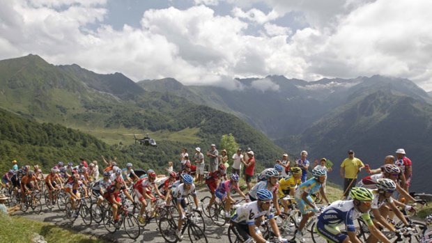 On top of the world &#8230; the peloton climbs Col d'Agnes in the Pyrenees on Saturday's 14th stage, with yellow jersey holder Thomas Voeckler ensconced in the middle and Cadel Evans and some of his red and black BMC teammates poised behind.