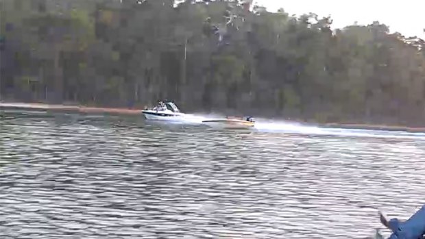 The two boats travelling on the Glen Mervyn Dam in Mumballup.