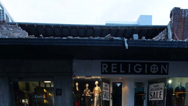 Weather damage ... strong winds tore the roof off a shop in Bondi.