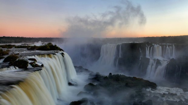 Niagara, eat your heart out: Sunset at the Iguazu Falls, Iguacu National Park, near the town of Foz do Iguacu, Parana, Brazil.