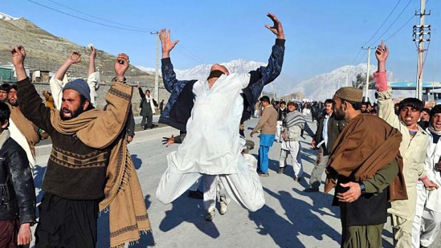 Outrage &#8230; Afghans shout anti-Western slogans at a protest against desecration of the Koran.