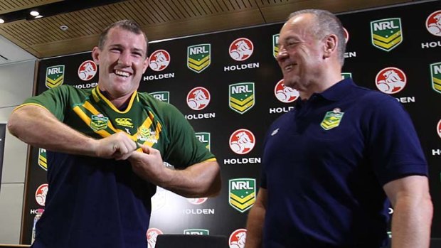 Big year ahead &#8230; coach Tim Sheens looks on as Paul Gallen models the new Kangaroos jumper on Thursday.