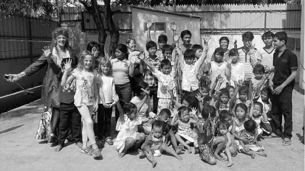 Love in Action founder Ruth Golder with children at the Cambodian orphanage.