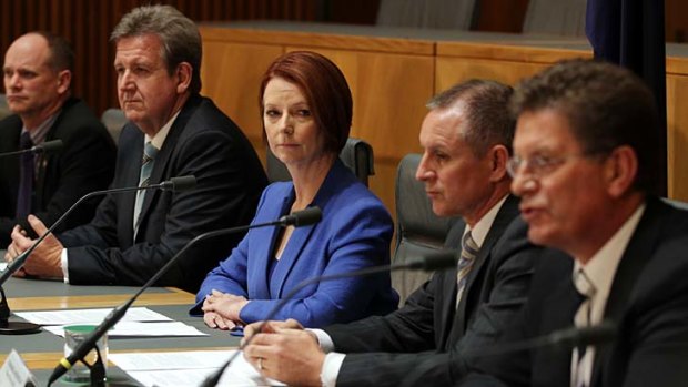 At odds ... Queensland Premier Campbell Newman, NSW Premier Barry O'Farrell, Prime Minister Julia Gillard, South Australian Premier Jay Wetherill and Victorian Premier Ted Baillieu.
