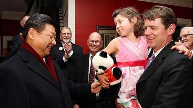 Greetings ... China's general secretary, Xi Jinping, meets the granddaughter of Sarah Lande in Iowa in February.