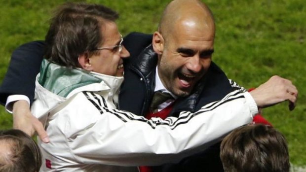 The joy of football: Pep Guardiola (R) has proved that the Barcelona model can be exported.