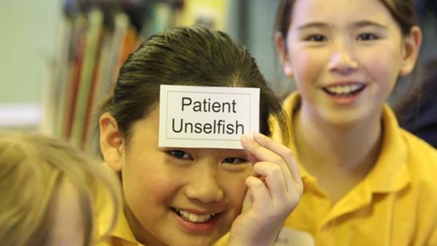 Oblivious to the culture war ... Michelia Yu, 10, and Lillian Lockett, 10, in the ethics class at Leichhardt Primary School, which is one of the 10 schools participating in the trial.