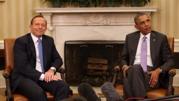The famous wink: Prime Minister Tony Abbott with US President Barack Obama this week.