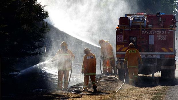 CFA firefighters put out whats left of a grass fire that burnt through the country town of Blampied half way between Daylesford and Ballarat.