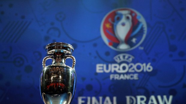 The European soccer championships trophy is put on display before the Euro 2016 soccer championships draw in Paris Saturday, Dec. 12, 2015.  (AP Photo/Christophe Ena)