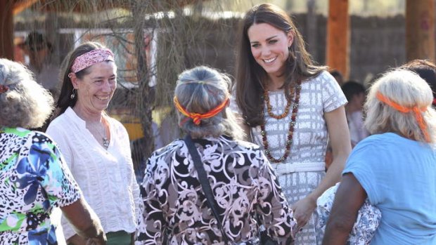 Soaring spirits: The Duchess of Cambridge meets artists at Uluru.