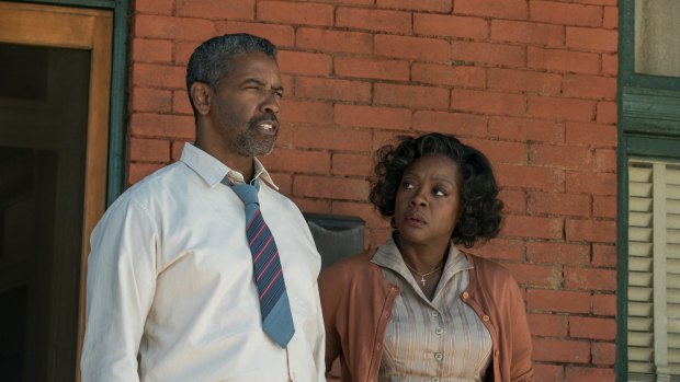 Denzel Washington and Viola Davis  in <i>Fences</i>, a film that never pushes to truly escape being stage bound.