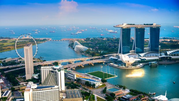 Marina Bay Sands (right) and the Singapore Flyer observation wheel. 