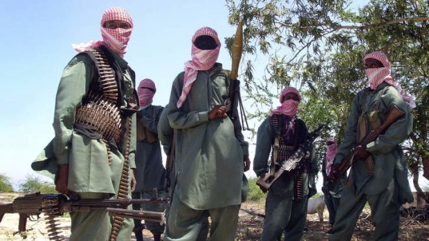 Members of Somalia's al-Shabab jihadist movement seen during exercises at their military training camp outside Mogadishu.  Al-Shabab said they targeted non-Muslims at the attack on a shopping mall in Nairobi.
