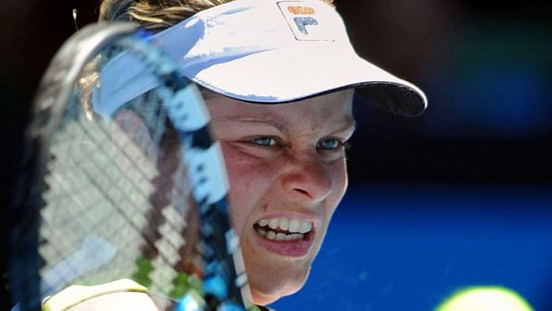 Defending champion  Kim Clijsters of Belgium defeated world No.1 Caroline Wozniacki.