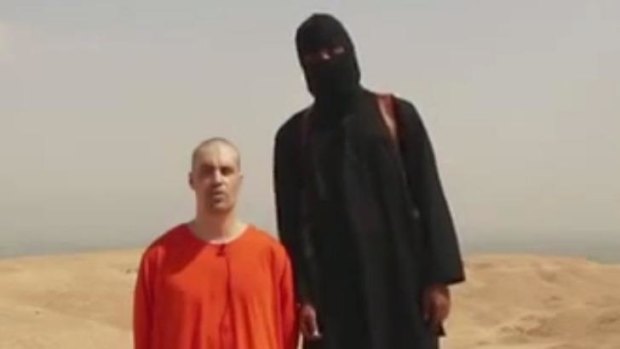 A screenshot of the video showing the moments before the purported execution of James Foley.