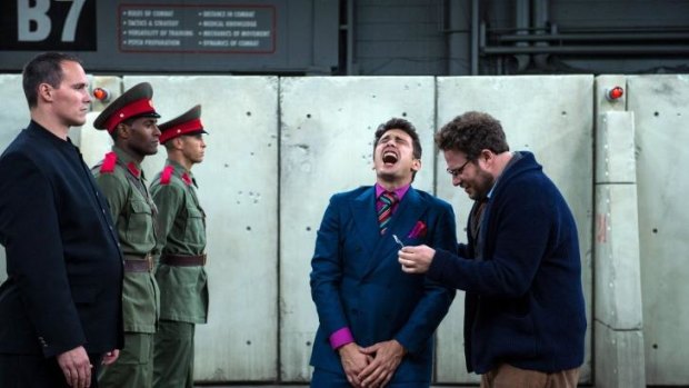 James Franco, centre, as Dave, and Seth Rogen, right, as Aaron, in <i>The Interview</i>.