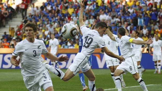 Penalty ... Italy's Daniele De Rossi falls to the ground after a challenge by Tommy Smith was judged a foul.