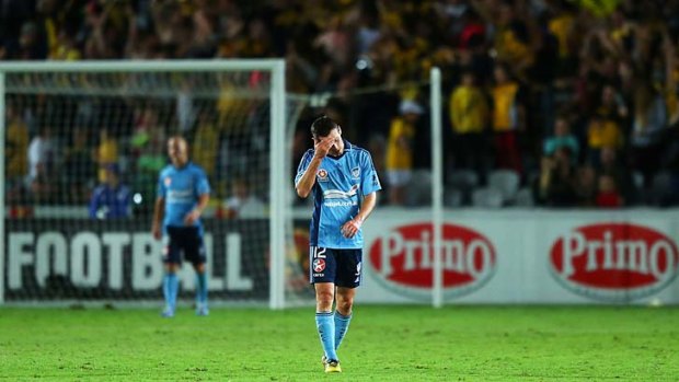 Marinated ... Sydney FC youngster Blake Powell cuts a dejected figure during the round-five disaster against Central Coast at Bluetongue Stadium.