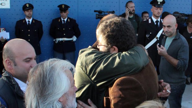 Relief &#8230; relatives of the victims of the 2009 L'Aquila earthquake embrace after a group of experts were sentenced to six years in jail for manslaughter.