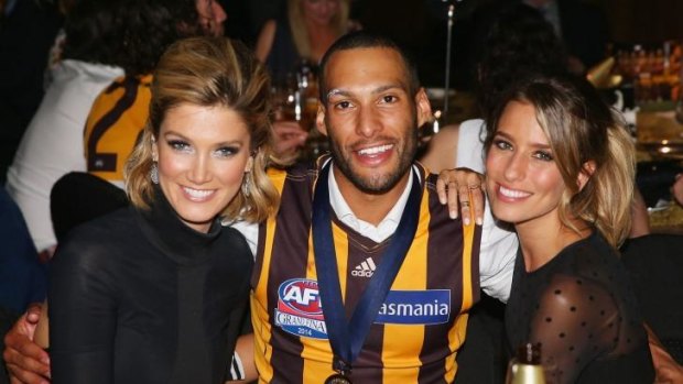 Josh Gibson with his girlfriend Renee Bargh (right) and singer Delta Goodrem after the game.