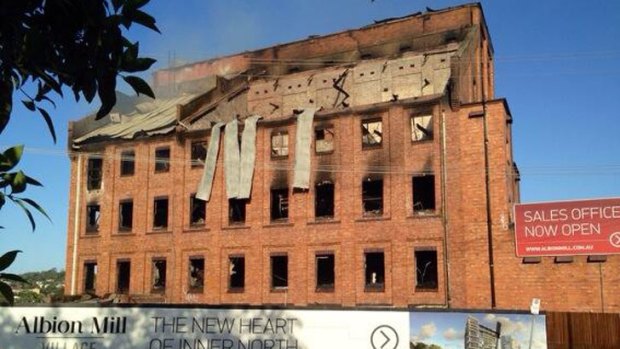 The charred remains of the Albion flour mill. Photo: Alyshia Gates/Nine News, via Twitter.