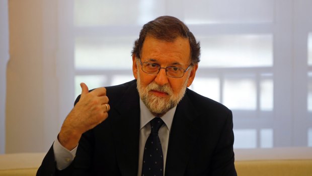 Spain's Prime Minister Mariano Rajoy has called on Catalan leader Carles Puigdemont to abandon plans to declare independence.