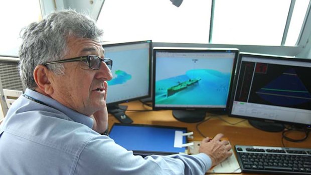 Harbour mapping ... senior hydrographic surveyor Tony Nusco looking at the sonar model of the ferry TSS Currajong that sank in 1910.