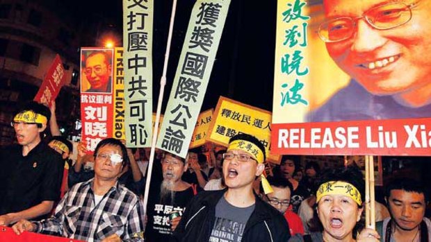 Democracy demonstrators call for the release of Liu Xiaobo in Hong Kong on Friday.